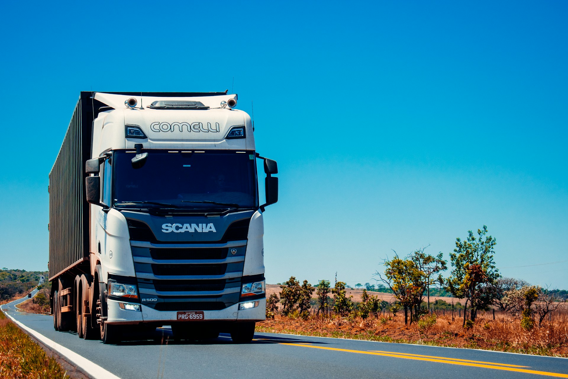 Freight truck on a highway representing DBA Malik Marcon Transport road service